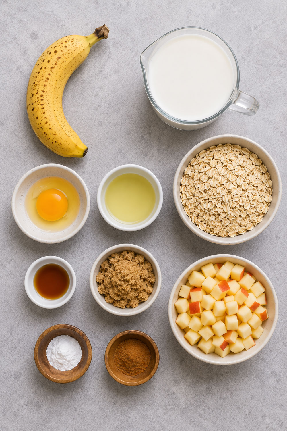 Muffin ingredients: banana, milk, oats, egg, oil, brown sugar, apples,