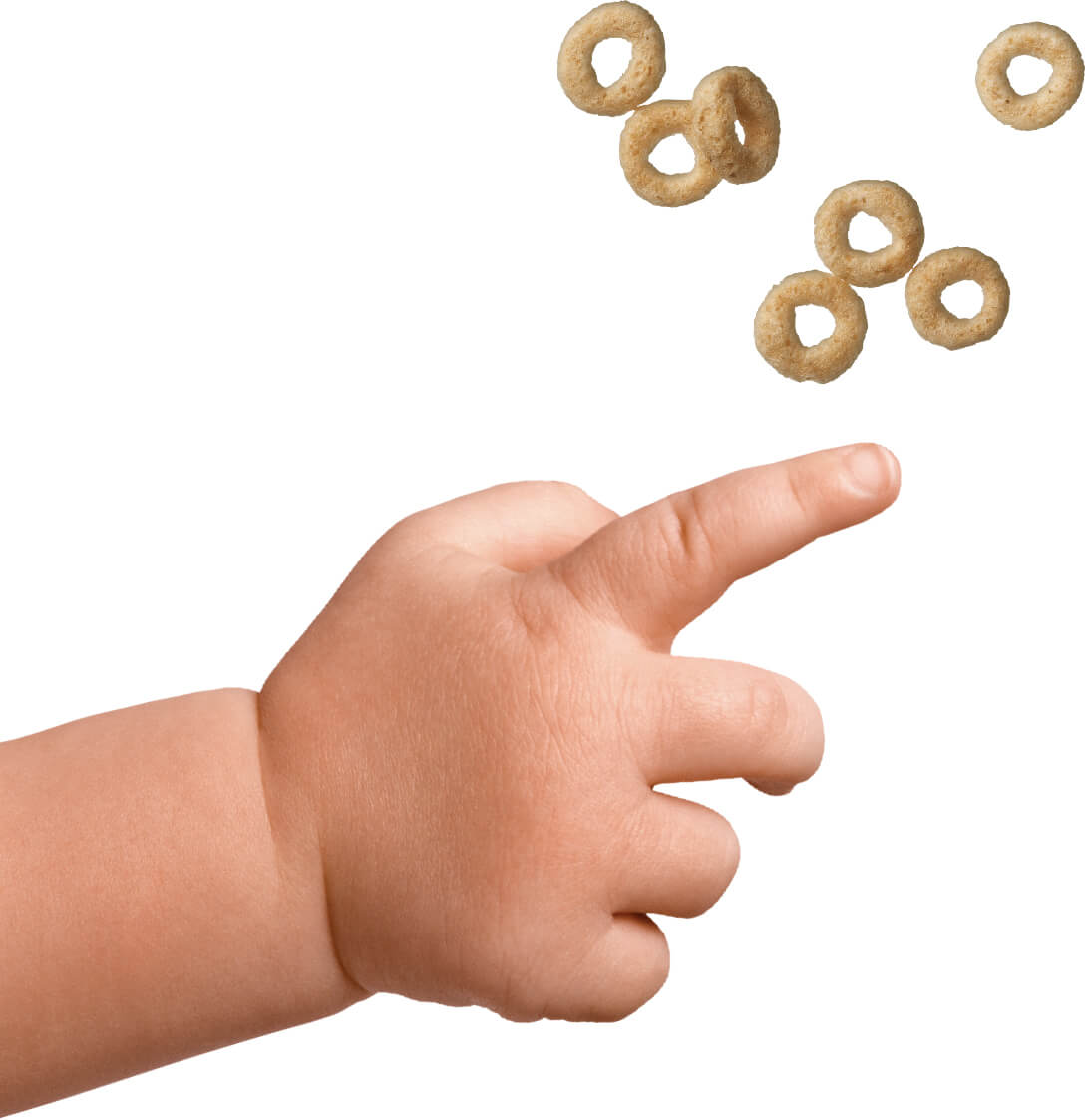 child hand reaching cereal