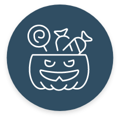 Halloween pumpkin pail filled with candy.