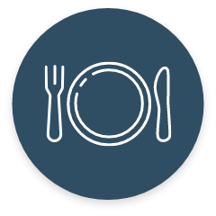 Plate with fork and knife on blue circle.